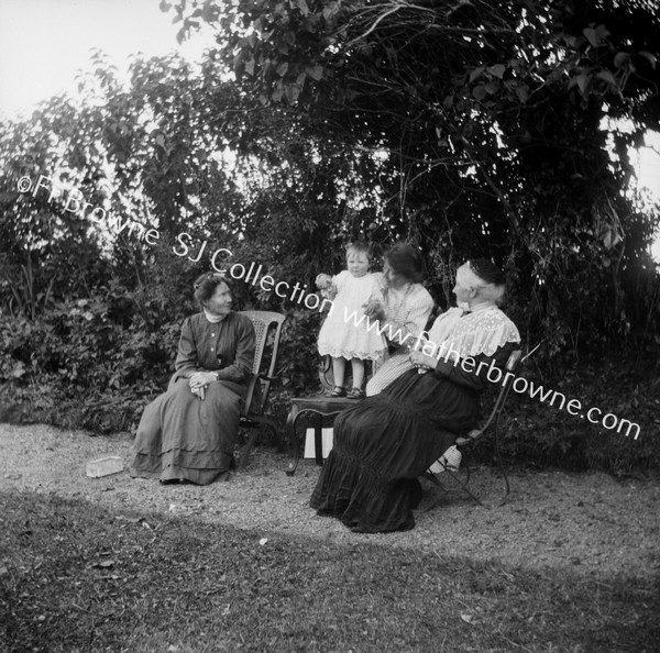 FAMILY GROUP IN GARDEN